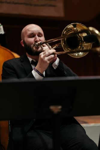 Instructor Jakob playing trombone