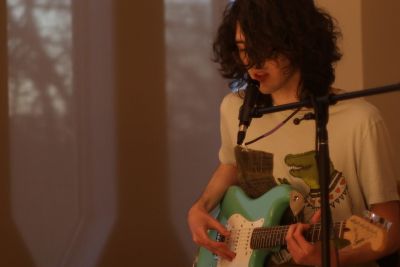 instructor David playing guitar